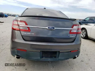 2013 Ford Taurus Limited z VIN 1FAHP2F89DG187913, wystawiony jako Copart lot #57096865 z przebiegiem 93 575 mil mil oraz Szkoda całkowita • Salvage title. Historia ofert i sprzedaży dostępna na DreamBid. Obrazek 6.