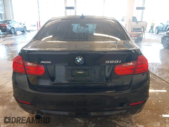 2015 BMW 3 Series 320i xDrive with VIN WBA3C3C56FK203031, listed as a IAAI auction lot 41012182 with 83,611 mi miles and . Bid and sale history available at DreamBid. Image 16.