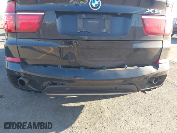 2012 BMW X5 35i z VIN 5UXZV4C50CL744724, wystawiony jako IAAI lot #41635239 z przebiegiem 166 363 mil mil oraz . Historia ofert i sprzedaży dostępna na DreamBid. Obrazek 6.