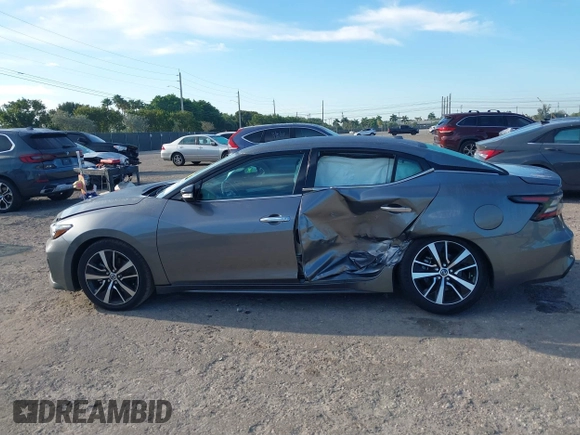 2021 Nissan Maxima SV z VIN 1N4AA6CVXMC508952, wystawiony jako IAAI lot #41900012 z przebiegiem 66 249 mil mil oraz . Historia ofert i sprzedaży dostępna na DreamBid. Obrazek 14.