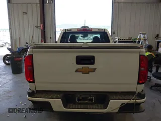 2020 Chevrolet Colorado 4WD LT with VIN 1GCHTCEA3L1189075, listed as a IAAI auction lot 42710899 with 71,439 mi miles and . Bid and sale history available at DreamBid. Image 16.
