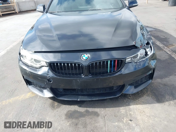 2014 BMW 4 Series 428i with VIN WBA3N7C55EF719504, listed as a IAAI auction lot 41403957 with 98,882 mi miles and . Bid and sale history available at carsss.com. Image 12.