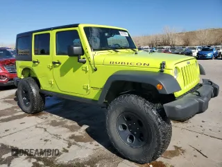 2016 Jeep Wrangler Unlimited Rubicon with VIN 1C4HJWFG2GL296235, listed as a Copart auction lot 50576595 with 60,076 mi miles and Salvage Title. Bid and sale history available at carsss.com. Image 4.
