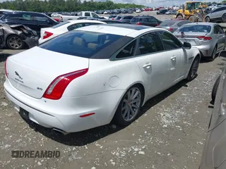 2015 Jaguar XJ with VIN SAJWA1CZ0F8V75119, listed as a IAAI auction lot 42248663 with 94,060 mi miles and . Bid and sale history available at DreamBid. Image 4.