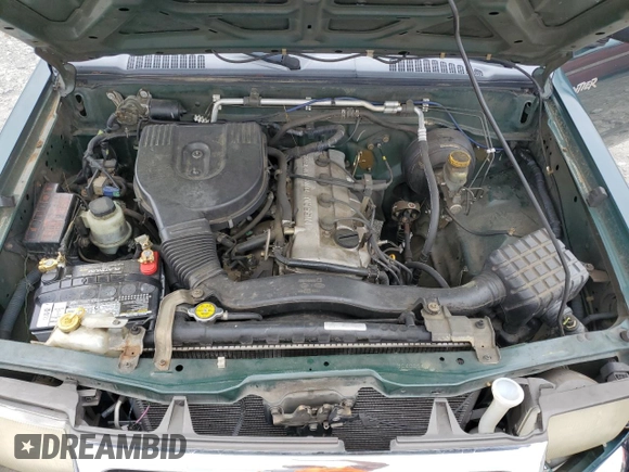 2000 Nissan Frontier XE with VIN 1N6DD26SXYC400648, listed as a Copart auction lot 58756855 with 148,051 mi miles and Salvage title. Bid and sale history available at DreamBid. Image 11.
