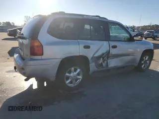2007 GMC Envoy SLE with VIN 1GKDT13SX72142175, listed as a Copart auction lot 45945305 with 169,048 mi miles and Salvage Title. Bid and sale history available at carsss.com. Image 3.