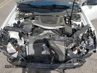 2013 Hyundai Genesis Coupe Track z VIN KMHHU6KJ9DU093661, wystawiony jako Copart lot #53787115 z przebiegiem 105 677 mil mil oraz Szkoda całkowita • Salvage title. Historia ofert i sprzedaży dostępna na DreamBid. Obrazek 11.
