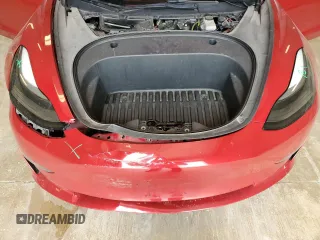 2022 Tesla Model 3 Long Range with VIN 5YJ3E1EBXNF285779, listed as a Copart auction lot 54630135 with 129,097 mi miles and Clean Title. Bid and sale history available at DreamBid. Image 11.