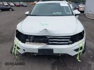 2018 Volkswagen Tiguan SEL with VIN 3VV2B7AX7JM099570, listed as a IAAI auction lot 42374274 with 87,838 mi miles and . Bid and sale history available at DreamBid. Image 6.