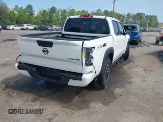 2023 Nissan Frontier Pro-4X with VIN 1N6ED1EK4PN646503, listed as a IAAI auction lot 42069729 with 40,951 mi miles and . Bid and sale history available at DreamBid. Image 4.