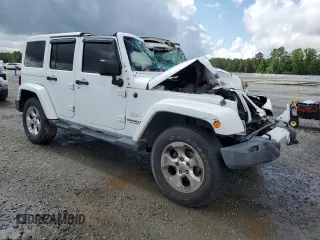 2013 Jeep Wrangler Unlimited Sahara with VIN 1C4HJWEG1DL516784, listed as a Copart auction lot 56382805 with 205,874 mi miles and Salvage title. Bid and sale history available at DreamBid. Image 4.