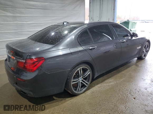 2015 BMW 7 Series 750Li xDrive z VIN WBAYF8C57FD653916, wystawiony jako Copart lot #52864275 z przebiegiem 138 811 mil mil oraz Szkoda całkowita • Salvage title. Historia ofert i sprzedaży dostępna na DreamBid. Obrazek 3.
