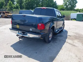 2001 Ford F-150 XLT with VIN 1FTRW08L71KC63676, listed as a IAAI auction lot 42536000 with 326,699 mi miles and . Bid and sale history available at DreamBid. Image 4.