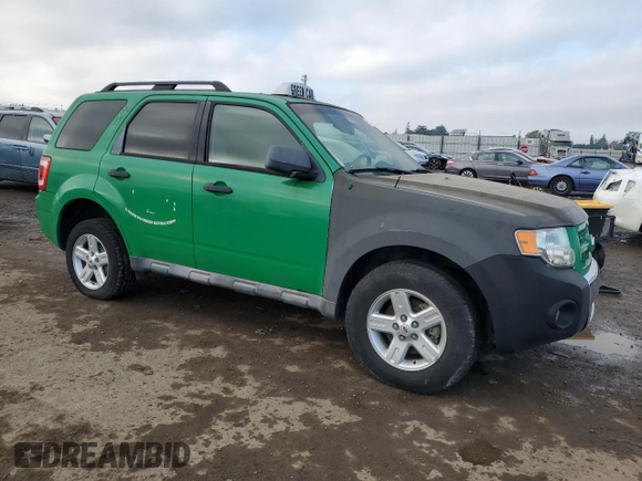 2010 Ford Escape Hybrid with VIN 1FMCU4K30AKC90709, listed as a Copart auction lot 85394774 with 183,092 mi miles and Salvage title. Bid and sale history available at DreamBid. Image 4.