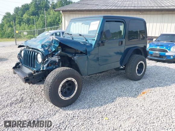 1998 Jeep Wrangler Sport with VIN 1J4FY19S2WP786844, listed as a IAAI auction lot 42382789 with 306,228 mi miles and . Bid and sale history available at DreamBid. Image 2.