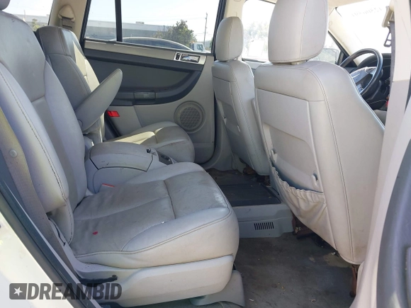 2007 Chrysler Pacifica Touring z VIN 2A8GM68XX7R337260, wystawiony jako IAAI lot #42506591 z przebiegiem Nie podano mil oraz . Historia ofert i sprzedaży dostępna na DreamBid. Obrazek 8.