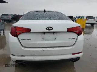 2013 Kia Optima EX z VIN 5XXGN4A75DG229393, wystawiony jako Copart lot #55855855 z przebiegiem 160 037 mil mil oraz Szkoda całkowita • Salvage title. Historia ofert i sprzedaży dostępna na DreamBid. Obrazek 6.