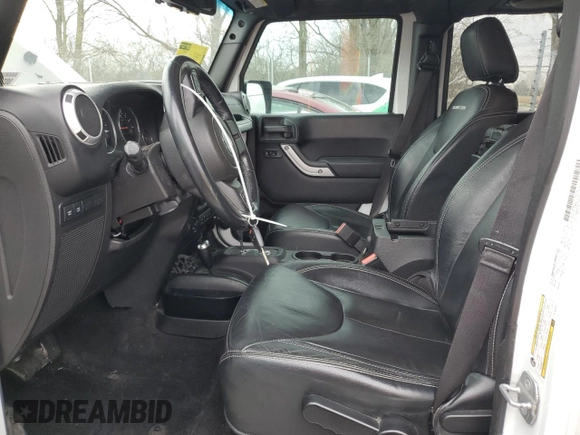2014 Jeep Wrangler Unlimited Rubicon с VIN 1C4BJWFG9EL150370, выставлен на аукционе Copart как лот 49917075 с пробегом 110 756 миль миль и Списание • Salvage title. История ставок и продаж доступна на DreamBid. Изображение 7.