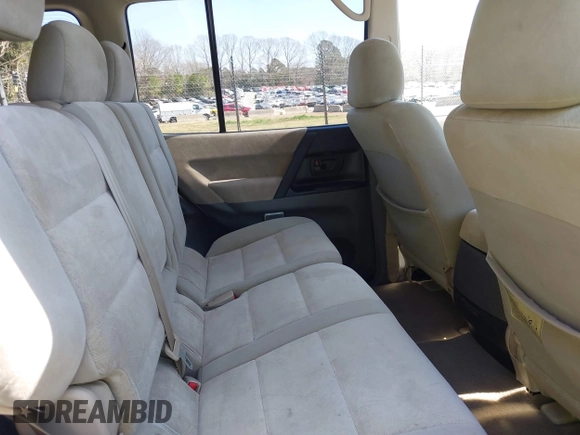 2002 Mitsubishi Montero XLS z VIN JA4MW31R52J070132, wystawiony jako IAAI lot #41782522 z przebiegiem 92 575 mil mil oraz . Historia ofert i sprzedaży dostępna na DreamBid. Obrazek 8.