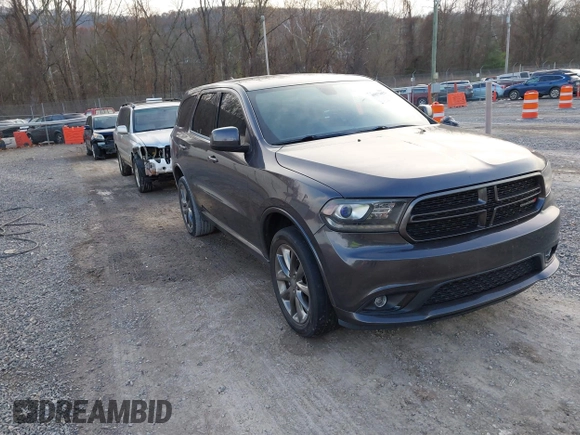 2015 Dodge Durango SXT with VIN 1C4RDJAG4FC784865, listed as a IAAI auction lot 40872452 with 145,877 mi miles and . Bid and sale history available at carsss.com. Image 1.