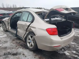 2014 BMW 3 Series 328i xDrive with VIN WBA3B5G52ENS09642, listed as a IAAI auction lot 41703927 with 109,402 mi miles and . Bid and sale history available at DreamBid. Image 3.