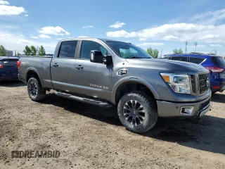2016 Nissan Titan XD PRO-4X with VIN 1N6BA1F47GN504254, listed as a Copart auction lot 56670974 with 173,312 mi miles and Clean Title. Bid and sale history available at carsss.com. Image 4.