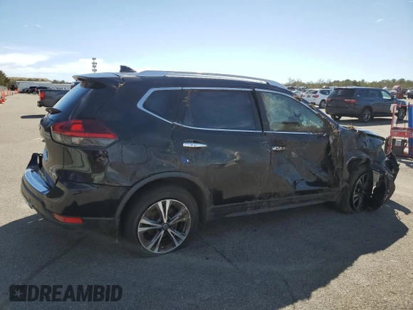 2019 Nissan Rogue SV with VIN JN8AT2MV1KW381701, listed as a Copart auction lot 49676375 with 104,157 mi miles and Salvage Title. Bid and sale history available at carsss.com. Image 3.