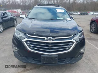 2018 Chevrolet Equinox Premier with VIN 2GNAXWEX6J6302935, listed as a IAAI auction lot 42065883 with 61,983 mi miles and . Bid and sale history available at carsss.com. Image 12.