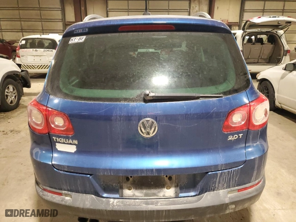 2009 Volkswagen Tiguan S with VIN WVGAV75N99W001723, listed as a Copart auction lot 43312365 with 193,171 mi miles and Salvage Title. Bid and sale history available at carsss.com. Image 6.