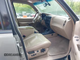 2000 Ford Explorer Eddie Bauer z VIN 1FMDU74E2YUA00568, wystawiony jako IAAI lot #42176409 z przebiegiem 150 479 mil mil oraz . Historia ofert i sprzedaży dostępna na DreamBid. Obrazek 5.