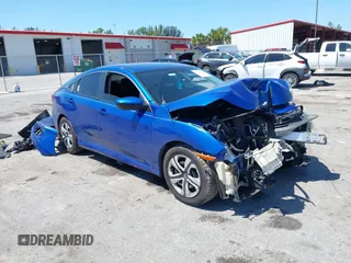 2018 Honda Civic LX with VIN 19XFC2F54JE027744, listed as a IAAI auction lot 42038398 with 119,250 mi miles and . Bid and sale history available at DreamBid. Image 1.