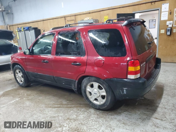 2003 Ford Escape XLT Popular 2 with VIN 1FMYU93103KB33975, listed as a Copart auction lot 70219724 with 182,037 mi miles and Clean Title. Bid and sale history available at carsss.com. Image 2.