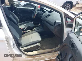 2016 Ford Fiesta S z VIN 3FADP4AJ3GM162049, wystawiony jako IAAI lot #42088627 z przebiegiem 37 652 mil mil oraz . Historia ofert i sprzedaży dostępna na DreamBid. Obrazek 5.