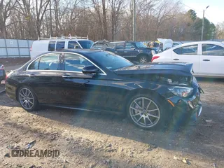 2021 Mercedes-Benz E-Class E 450 with VIN W1KZF5KB8MB002449, listed as a IAAI auction lot 41224307 with 57,093 mi miles. Bid and sale history available at carsss.com. Image 13.