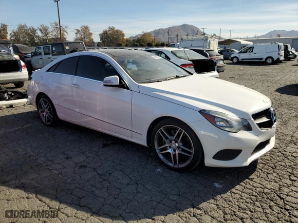 2015 Mercedes-Benz E-Class E 400 with VIN WDDKJ6FB0FF294447, listed as a Copart auction lot 84929364 with 96,689 mi miles and Salvage Title. Bid and sale history available at carsss.com. Image 4.