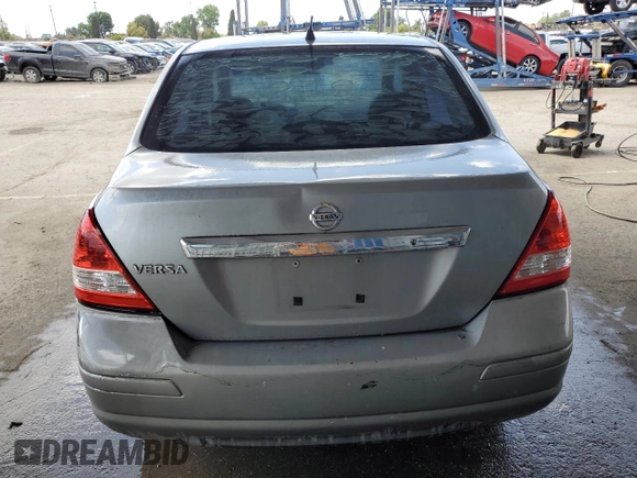2011 Nissan Versa S with VIN 3N1BC1AP3BL404551, listed as a Copart auction lot 51977085 with 207,070 mi miles and Salvage title. Bid and sale history available at DreamBid. Image 6.