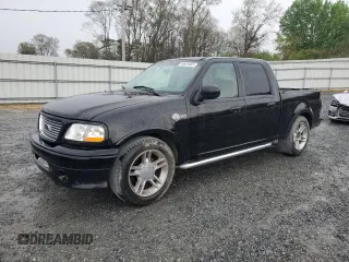 2002 Ford F-150 Harley Davidson with VIN 1FTRW07332KD27893, listed as a Copart auction lot 49691005 with 248,906 mi miles and Salvage Title. Bid and sale history available at carsss.com. Image 1.