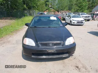 1996 Honda Civic DX z VIN 1HGEJ6122TL081822, wystawiony jako IAAI lot #42364331 z przebiegiem 121 686 mil mil oraz . Historia ofert i sprzedaży dostępna na DreamBid. Obrazek 13.