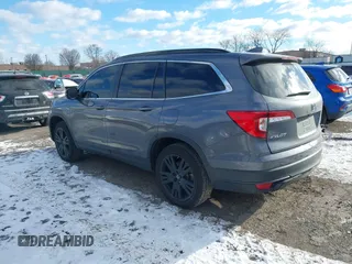 2022 Honda Pilot Special Edition with VIN 5FNYF6H20NB063506, listed as a IAAI auction lot 41239636 with 59,752 mi miles. Bid and sale history available at carsss.com. Image 3.