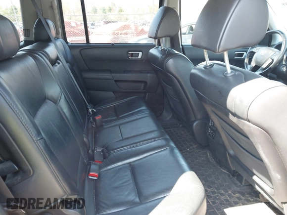 2011 Honda Pilot Touring with VIN 5FNYF4H94BB035415, listed as a IAAI auction lot 42126738 with 239,273 mi miles. Bid and sale history available at carsss.com. Image 8.