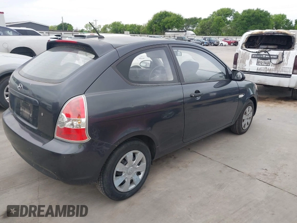 2007 Hyundai Accent GS with VIN KMHCM36C07U003757, listed as a IAAI auction lot 41925544 with 89,882 mi miles. Bid and sale history available at carsss.com. Image 4.