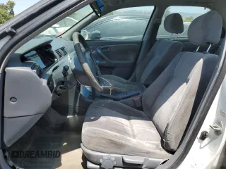 1997 Toyota Camry LE with VIN JT2BG22K7V0005405, listed as a Copart auction lot 58988545 with 268,952 mi miles and Salvage title. Bid and sale history available at DreamBid. Image 7.