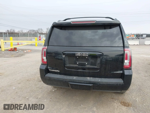 2016 GMC Yukon SLT with VIN 1GKS1BKC3GR272738, listed as a IAAI auction lot 41712439 with 169,726 mi miles. Bid and sale history available at carsss.com. Image 16.