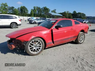 2010 Ford Mustang V6 with VIN 1ZVBP8AN7A5169866, listed as a Copart auction lot 66411215 with Not provided miles and Salvage title. Bid and sale history available at DreamBid. Image 1.