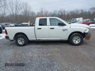 2019 Ram 1500 Tradesman z VIN 1C6RR7FG6KS626077, wystawiony jako IAAI lot #41686501 z przebiegiem 86 338 mil mil oraz . Historia ofert i sprzedaży dostępna na DreamBid. Obrazek 13.