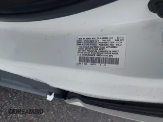2012 Honda Odyssey EX-L with VIN 5FNRL5H60CB134954, listed as a IAAI auction lot 41942488 with 192,069 mi miles and . Bid and sale history available at DreamBid. Image 9.