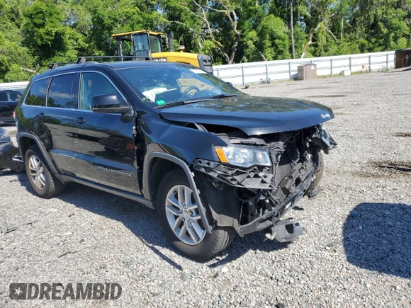 2017 Jeep Grand Cherokee Laredo with VIN 1C4RJEAG9HC780281, listed as a Copart auction lot 50747024 with 100,446 mi miles and Salvage title. Bid and sale history available at DreamBid. Image 4.