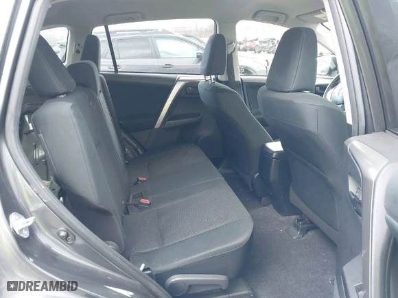 2018 Toyota RAV4 LE with VIN JTMBFREV8JJ184809, listed as a IAAI auction lot 41901048 with 76,699 mi miles. Bid and sale history available at carsss.com. Image 8.