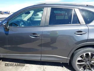2016 Mazda CX-5 Grand Touring with VIN JM3KE2DY9G0824196, listed as a IAAI auction lot 41801887 with 88,625 mi miles. Bid and sale history available at carsss.com. Image 15.