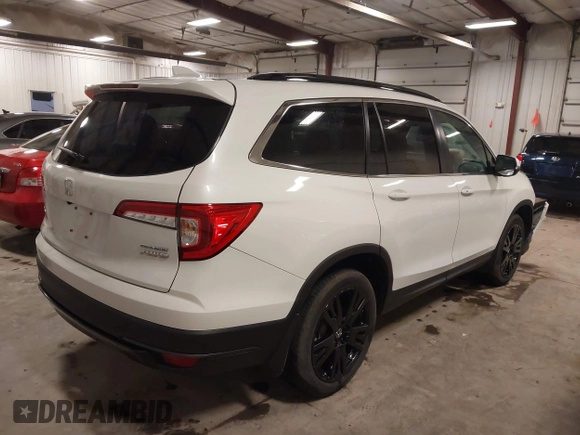 2022 Honda Pilot Special Edition with VIN 5FNYF6H27NB105041, listed as a IAAI auction lot 41916708 with 15,848 mi miles and . Bid and sale history available at DreamBid. Image 4.